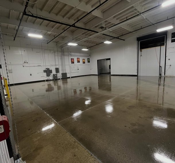 Glossy sealed concrete floor in a warehouse